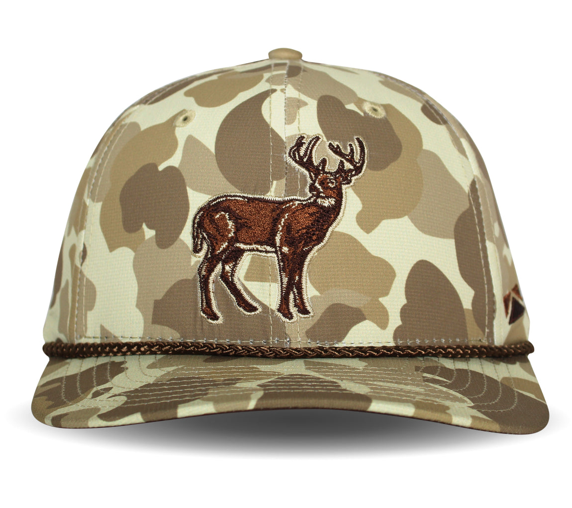 Camouflage baseball cap with deer emblem on a white background
