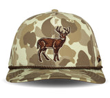Camouflage baseball cap with deer emblem on a white background